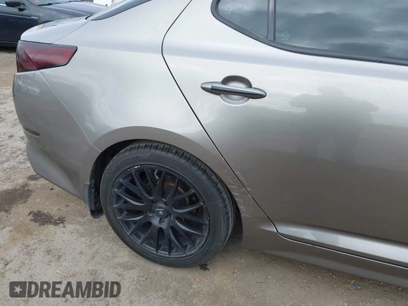 2015 Kia Optima EX with VIN 5XXGN4A7XFG423145, listed as a IAAI auction lot 42068943 with 113,730 mi miles and . Bid and sale history available at DreamBid. Image 18.