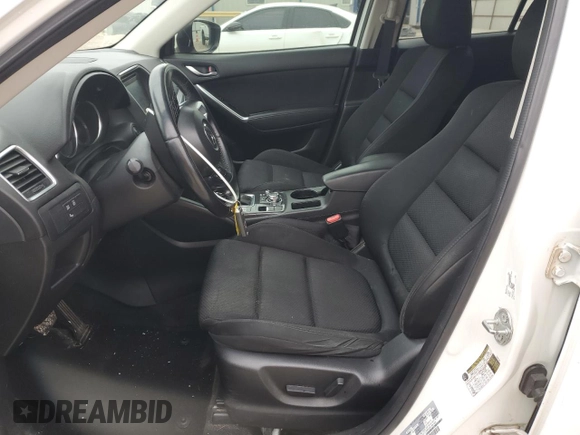 2016 Mazda CX-5 Touring with VIN JM3KE2CY9G0733933, listed as a Copart auction lot 45118885 with 149,901 mi miles and Salvage Title. Bid and sale history available at carsss.com. Image 7.