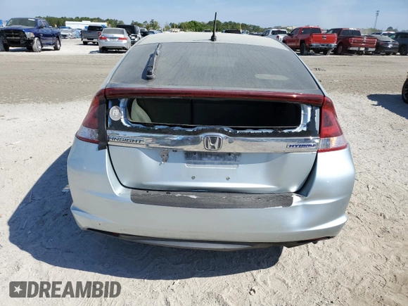 2012 Honda Insight EX z VIN JHMZE2H7XCS002156, wystawiony jako Copart lot #50825825 z przebiegiem 425 939 mil mil oraz Szkoda całkowita • Salvage title. Historia ofert i sprzedaży dostępna na DreamBid. Obrazek 6.