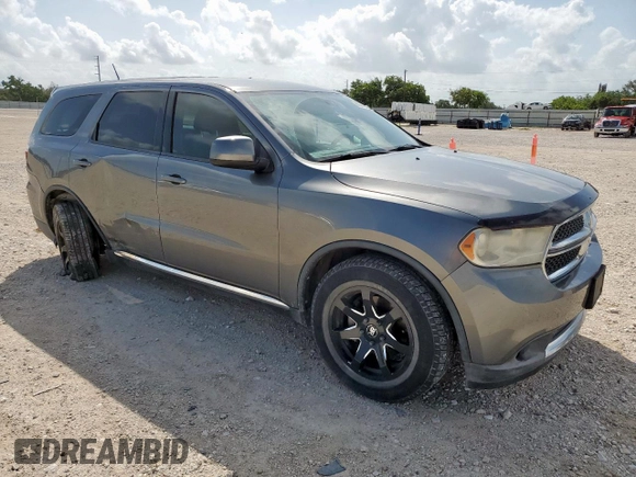 2013 Dodge Durango SXT with VIN 1C4RDHAGXDC592730, listed as a Copart auction lot 60841945 with 130,239 mi miles and Salvage title. Bid and sale history available at DreamBid. Image 4.