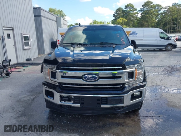 2019 Ford F-150 XL with VIN 1FTEW1E56KFA63764, listed as a IAAI auction lot 42410872 with 124,648 mi miles and . Bid and sale history available at DreamBid. Image 12.