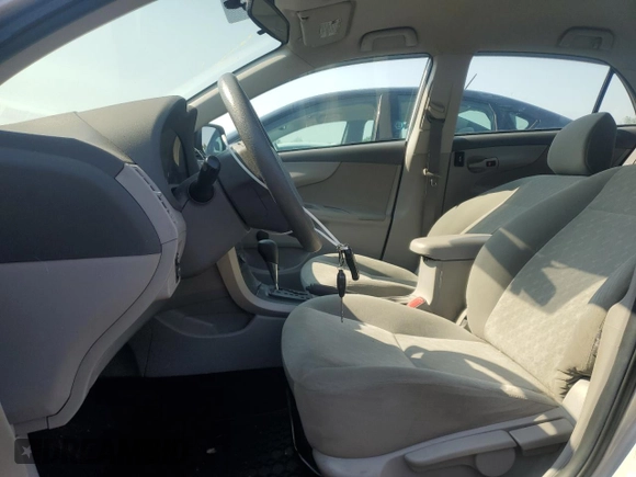 2010 Toyota Corolla with VIN 2T1BU4EE3AC451732, listed as a Copart auction lot 61866625 with 215,714 mi miles and Clean title. Bid and sale history available at DreamBid. Image 7.