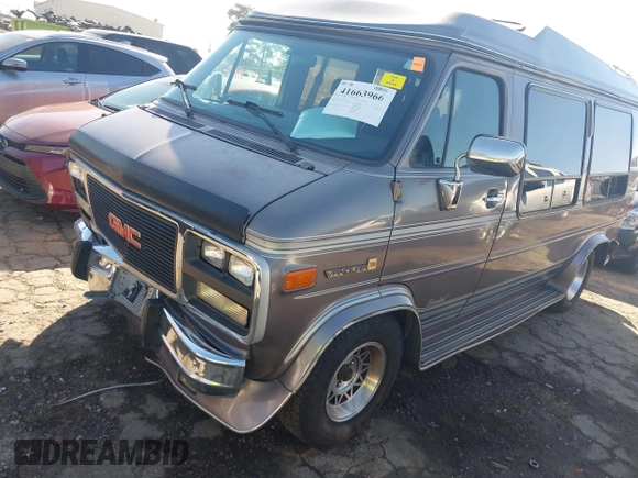 1993 GMC Vandura z VIN 1GDEG25KXPF515274, wystawiony jako IAAI lot #41663966 z przebiegiem 112 288 mil mil oraz . Historia ofert i sprzedaży dostępna na DreamBid. Obrazek 17.