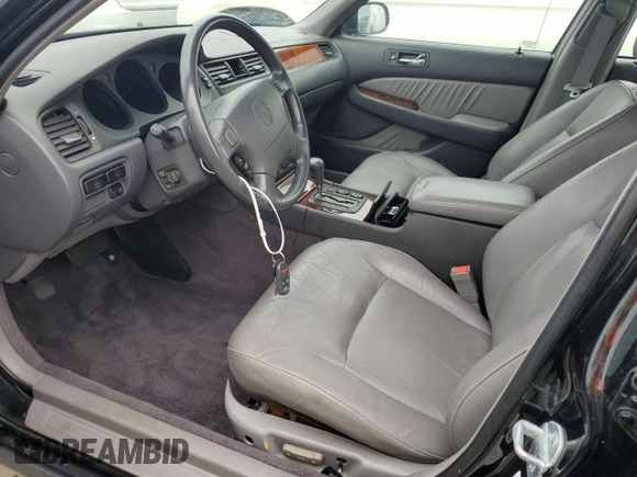 1998 Acura RL Premium with VIN JH4KA9656WC001298, listed as a Copart auction lot 73740154 with 108,066 mi miles and Salvage Title. Bid and sale history available at carsss.com. Image 7.