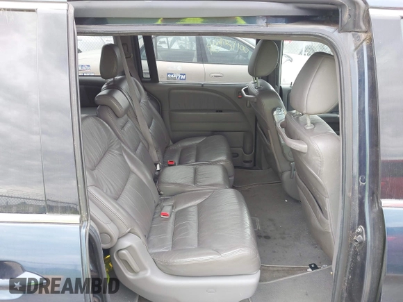 2009 Honda Odyssey EX-L with VIN 5FNRL38769B409281, listed as a IAAI auction lot 42013137 with 213,934 mi miles and . Bid and sale history available at DreamBid. Image 8.