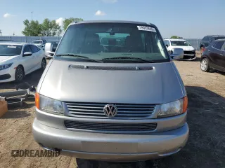 2000 Volkswagen EuroVan с VIN WV2MH4703YH013265, выставлен на аукционе Copart как лот 59003645 с пробегом Не указан миль и Списание • Salvage title. История ставок и продаж доступна на DreamBid. Изображение 5.