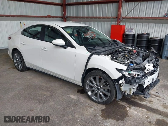 2019 Mazda 3 w/Select with VIN JM1BPACL2K1106916, listed as a IAAI auction lot 42082381 with 63,017 mi miles. Bid and sale history available at carsss.com. Image 1.