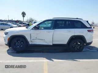 2023 Jeep Grand Cherokee Laredo with VIN 1C4RJHAGXPC660392, listed as a IAAI auction lot 41845564 with 7,444 mi miles and . Bid and sale history available at DreamBid. Image 14.