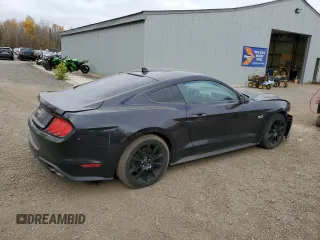 2022 Ford Mustang GT с VIN 1FA6P8CF0N5118652, выставлен на аукционе Copart как лот 75289414 с пробегом 38 077 миль миль и Списание • Salvage title. История ставок и продаж доступна на DreamBid. Изображение 3.