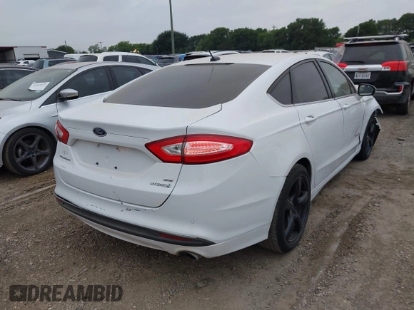 2014 Ford Fusion SE Hybrid with VIN 3FA6P0LU9ER243047, listed as a IAAI auction lot 42417116 with 258,266 mi miles and . Bid and sale history available at DreamBid. Image 4.