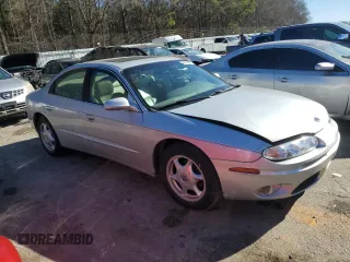 2001 Oldsmobile Aurora z VIN 1G3GS64C614157056, wystawiony jako Copart lot #88938065 z przebiegiem 121 688 mil mil oraz Szkody całkowita. Historia ofert i sprzedaży dostępna na DreamBid. Obrazek 4.