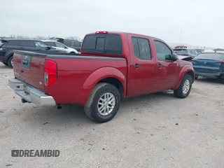 2014 Nissan Frontier SV with VIN 1N6AD0ER7EN765231, listed as a IAAI auction lot 41932925 with 110,021 mi miles and . Bid and sale history available at DreamBid. Image 4.