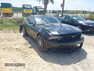 2012 Ford Mustang GT Premium с VIN 1ZVBP8CF0C5255707, выставлен на аукционе IAAI как лот 39283237 с пробегом 122 434 миль миль и . История ставок и продаж доступна на DreamBid. Изображение 1.