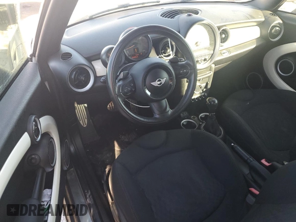 2015 MINI Convertible S with VIN WMWZP3C52FT708377, listed as a Copart auction lot 79817344 with 54,466 mi miles and Salvage title. Bid and sale history available at DreamBid. Image 8.
