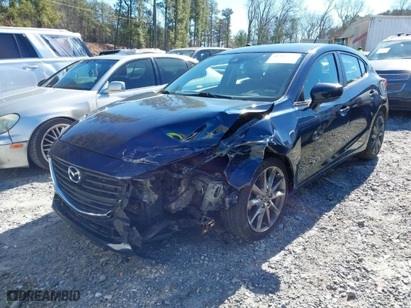 2018 Mazda Mazda3 5-Door Touring with VIN 3MZBN1L36JM265183, listed as a IAAI auction lot 41581779 with 72,410 mi miles. Bid and sale history available at carsss.com. Image 2.
