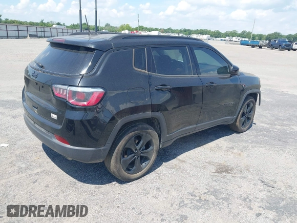 2019 Jeep Compass Latitude with VIN 3C4NJCBB9KT613016, listed as a IAAI auction lot 42570739 with 41,944 mi miles and . Bid and sale history available at DreamBid. Image 4.