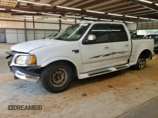 2001 Ford F-150 XLT with VIN 1FTRW07W51KE03221, listed as a Copart auction lot 63628855 with 237,510 mi miles and Salvage title. Bid and sale history available at DreamBid. Image 1.