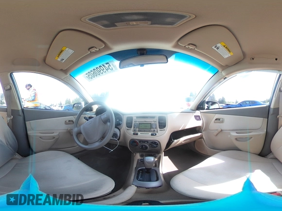 2009 Kia Rio LX with VIN KNADE223896456292, listed as a Copart auction lot 54990605 with 61,220 mi miles and Salvage Title. Bid and sale history available at DreamBid. Image 14.
