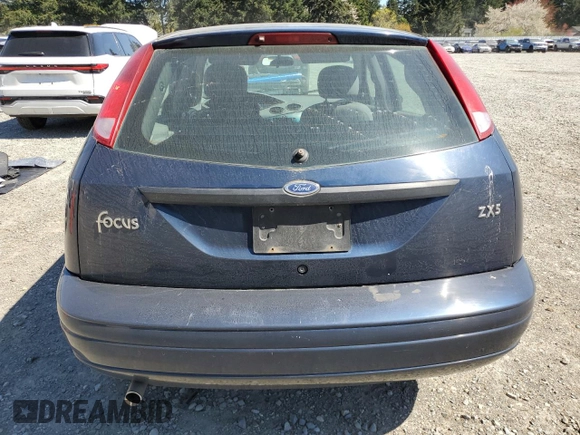2004 Ford Focus ZX5 z VIN 3FAFP37354R114742, wystawiony jako Copart lot #53533315 z przebiegiem 383 279 mil mil oraz Szkoda całkowita • Salvage title. Historia ofert i sprzedaży dostępna na DreamBid. Obrazek 6.