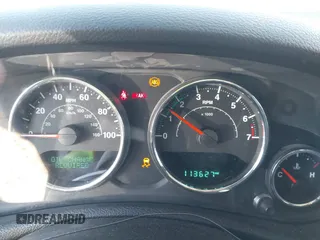2015 Jeep Wrangler Unlimited Sahara with VIN 1C4BJWEG2FL558860, listed as a IAAI auction lot 41937360 with 113,627 mi miles. Bid and sale history available at carsss.com. Image 7.