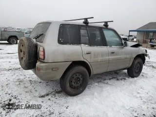 2000 Toyota RAV4 z VIN JT3HP10V9Y7166931, wystawiony jako Copart lot #83844934 z przebiegiem Nie podano mil oraz Czysty tytuł • Clean title. Historia ofert i sprzedaży dostępna na DreamBid. Obrazek 3.