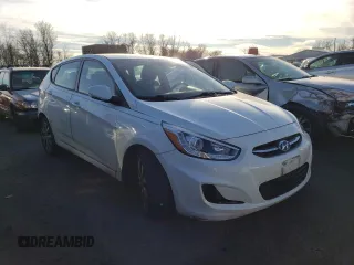 2015 Hyundai Accent Sport with VIN KMHCU5AE2FU217782, listed as a Copart auction lot 41446935 with 99,764 mi miles and Clean Title. Bid and sale history available at carsss.com. Image 4.