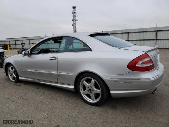 2004 Mercedes-Benz CLK-Class 5.0L with VIN WDBTJ75J04F110990, listed as a Copart auction lot 85511414 with 251,096 mi miles and Salvage Title. Bid and sale history available at carsss.com. Image 2.