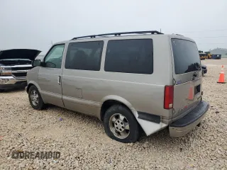 2003 Chevrolet Astro z VIN 1GNEL19X33B102489, wystawiony jako Copart lot #55686585 z przebiegiem 200 050 mil mil oraz Szkody całkowita. Historia ofert i sprzedaży dostępna na DreamBid. Obrazek 2.