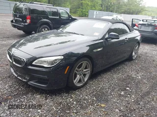 2017 BMW 6 Series 650i xDrive z VIN WBA6F7C52HD930816, wystawiony jako IAAI lot #42168478 z przebiegiem 89 191 mil mil oraz . Historia ofert i sprzedaży dostępna na DreamBid. Obrazek 17.