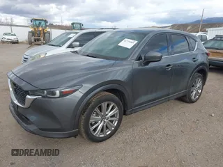 2023 Mazda CX-5 Signature with VIN JM3KFBXY9P0102087, listed as a IAAI auction lot 41771949 with 35,610 mi miles and . Bid and sale history available at carsss.com. Image 17.