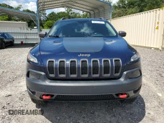 2014 Jeep Cherokee Trailhawk with VIN 1C4PJMBS7EW170345, listed as a Copart auction lot 60565765 with 98,382 mi miles and Salvage title. Bid and sale history available at DreamBid. Image 5.