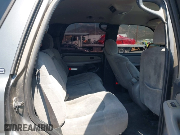 2001 Chevrolet Tahoe LS z VIN 1GNEC13T51J153677, wystawiony jako IAAI lot #42459552 z przebiegiem 201 209 mil mil oraz . Historia ofert i sprzedaży dostępna na DreamBid. Obrazek 8.