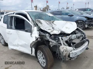 2015 Toyota Yaris L with VIN VNKKTUD39FA027316, listed as a IAAI auction lot 39022940 with 110,063 mi miles and . Bid and sale history available at DreamBid. Image 6.
