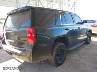 2017 Chevrolet Tahoe Commercial with VIN 1GNLCDEC8HR385630, listed as a IAAI auction lot 41262095 with 182,011 mi miles. Bid and sale history available at carsss.com. Image 4.