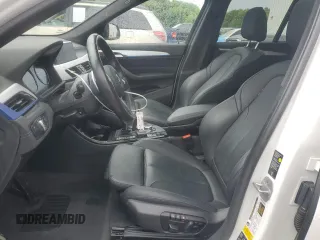 2021 BMW X1 xDrive28i with VIN WBXJG9C07M3M67312, listed as a Copart auction lot 59712835 with 62,371 mi miles and Salvage title. Bid and sale history available at DreamBid. Image 7.