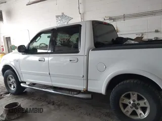 2003 Ford F-150 XLT with VIN 1FTRW08L03KB51627, listed as a IAAI auction lot 42497227 with 330,207 mi miles and . Bid and sale history available at DreamBid. Image 14.