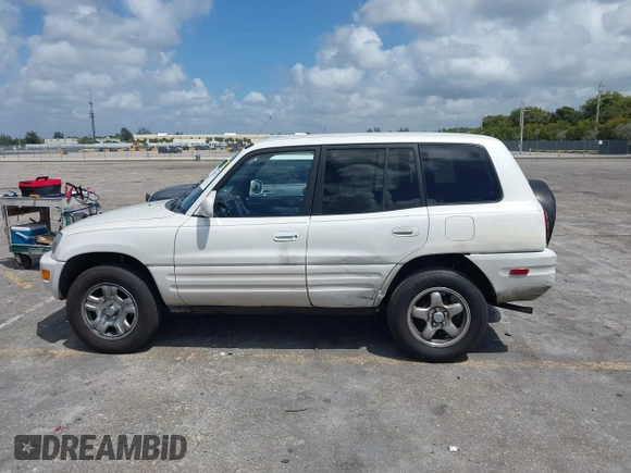 1999 Toyota RAV4 with VIN JT3GP10V5X7043735, listed as a IAAI auction lot 41939137 with 206,044 mi miles and . Bid and sale history available at DreamBid. Image 14.