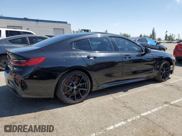 2022 BMW 8 Series M850i with VIN WBAGV8C02NCK08667, listed as a Copart auction lot 50335155 with 22,737 mi miles and Salvage title. Bid and sale history available at DreamBid. Image 3.