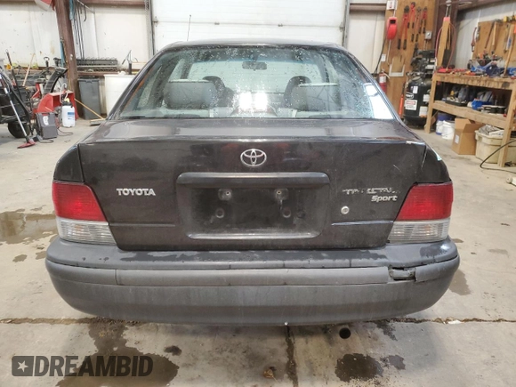 1999 Toyota Tercel z VIN JT2AC53LXX0390154, wystawiony jako Copart lot #83014424 z przebiegiem 182 579 mil mil oraz Szkoda całkowita • Salvage title. Historia ofert i sprzedaży dostępna na DreamBid. Obrazek 6.