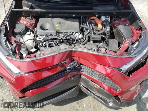 2023 Toyota RAV4 Hybrid XLE Premium with VIN JTMB6RFV2PD541262, listed as a Copart auction lot 60106845 with 32,447 mi miles and Salvage title. Bid and sale history available at DreamBid. Image 12.