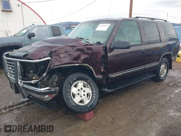 1997 GMC Yukon with VIN 1GKEK13R0VJ755574, listed as a IAAI auction lot 41158932 with 212,668 mi miles. Bid and sale history available at carsss.com. Image 18.