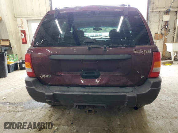 2001 Jeep Grand Cherokee Laredo z VIN 1J4GW48S11C609344, wystawiony jako Copart lot #59258245 z przebiegiem 162 141 mil mil oraz Szkoda całkowita • Salvage title. Historia ofert i sprzedaży dostępna na DreamBid. Obrazek 6.