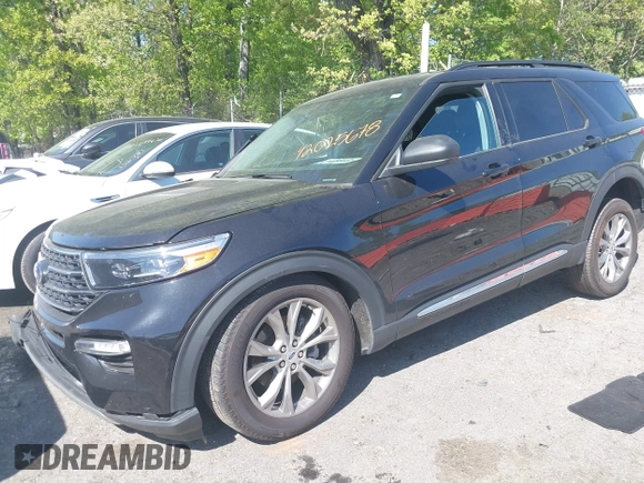 2023 Ford Explorer XLT with VIN 1FMSK8DH1PGB85514, listed as a IAAI auction lot 42025678 with 44,600 mi miles. Bid and sale history available at carsss.com. Image 2.