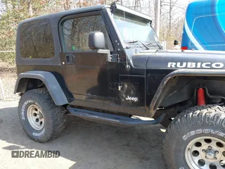 2004 Jeep Wrangler Rubicon with VIN 1J4FA69S64P789308, listed as a IAAI auction lot 41714489 with 186,302 mi miles. Bid and sale history available at carsss.com. Image 13.
