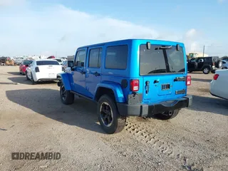 2014 Jeep Wrangler Unlimited Sahara with VIN 1C4HJWEG1EL188445, listed as a IAAI auction lot 42742737 with 79,948 mi miles and . Bid and sale history available at DreamBid. Image 3.