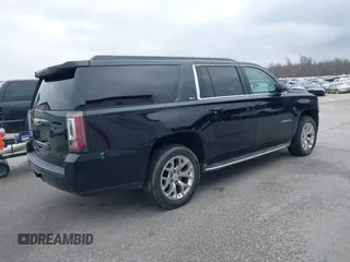 2015 GMC Yukon XL SLT with VIN 1GKS2HKC6FR746809, listed as a IAAI auction lot 41559570 with 144,401 mi miles. Bid and sale history available at carsss.com. Image 4.