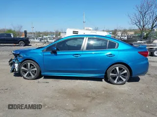 2019 Subaru Impreza Special Sports z VIN 4S3GKAJ63K3614883, wystawiony jako IAAI lot #42050731 z przebiegiem 65 579 mil mil oraz . Historia ofert i sprzedaży dostępna na DreamBid. Obrazek 13.
