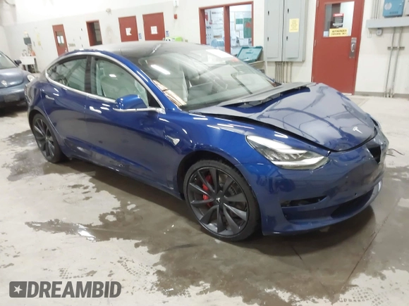 2020 Tesla Model 3 Performance z VIN 5YJ3E1EC7LF641885, wystawiony jako IAAI lot #41372794 z przebiegiem Nie podano mil oraz . Historia ofert i sprzedaży dostępna na DreamBid. Obrazek 1.