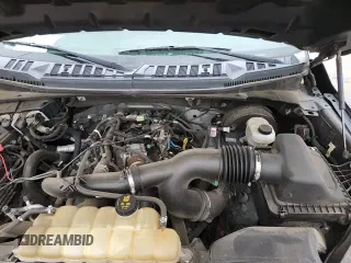 2020 Ford F-150 XL с VIN 1FTEW1CP8LFB46571, выставлен на аукционе Copart как лот 70697585 с пробегом 142 476 миль миль и Списание • Salvage title. История ставок и продаж доступна на DreamBid. Изображение 14.