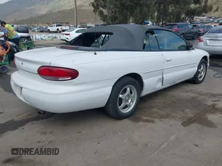 1998 Chrysler Sebring JX with VIN 3C3EL45HXWT262448, listed as a IAAI auction lot 42024888 with 93,913 mi miles and . Bid and sale history available at DreamBid. Image 4.